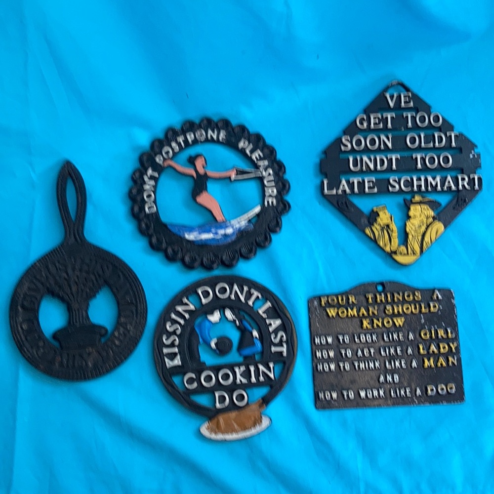 5 antique trivets with cute sayings.
